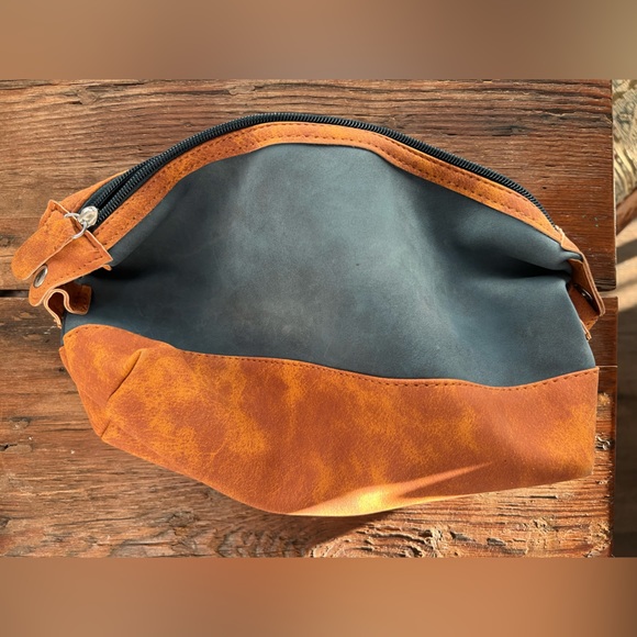 Choctaw Casino overnight toiletry bag.  Navy blue and deep brown faux leather. - Picture 2 of 3